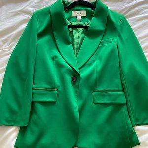 Green woman’s blazer